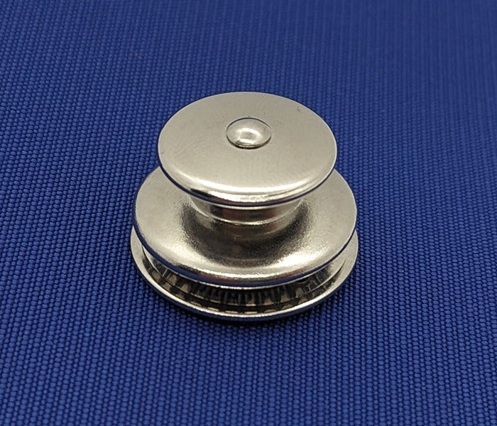 Tomax Fastener on Blue Cloth